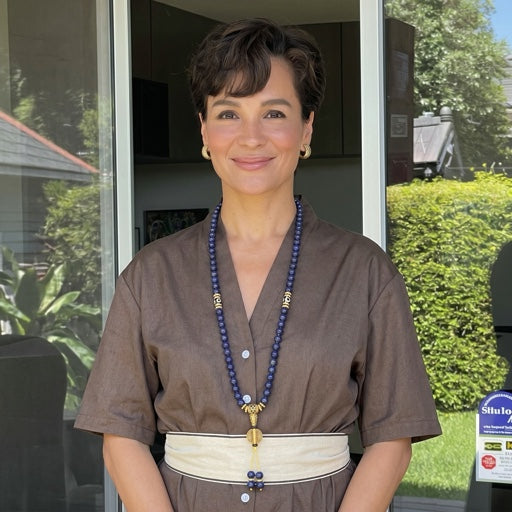 Teresa Nguyen, customer wearing the lapis lazuli mala