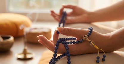 19 Hands Holding Mala2.jpg__PID:213c6575-97e3-4d14-bb99-f460ba17cafd